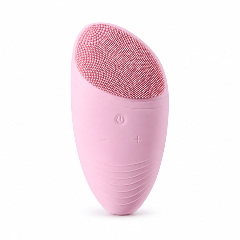 Pink rechargeable silicone facial cleansing brush on white background