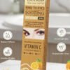Brightening under-eye tint cream with vitamin C jar close-up