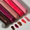 image-2_398f615c-8288-4ea7-be31-e108b9059766.jpeg Hybrid lip oil glossy texture swatch on lips